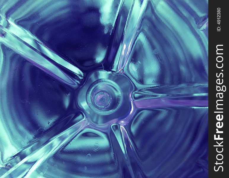 Detail of a blue water bottle, abstract. Detail of a blue water bottle, abstract