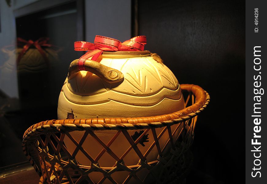 A decoration with a pot in a basket