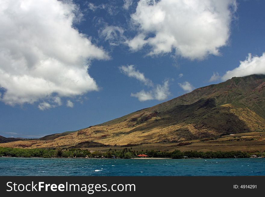 Taken from a boat on the ocean in Maui looking at the landscape. Taken from a boat on the ocean in Maui looking at the landscape.