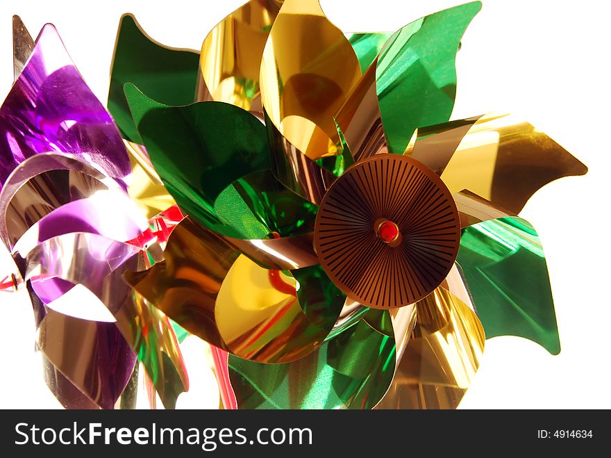 Pinwheels of bright colors made of metallic plastic