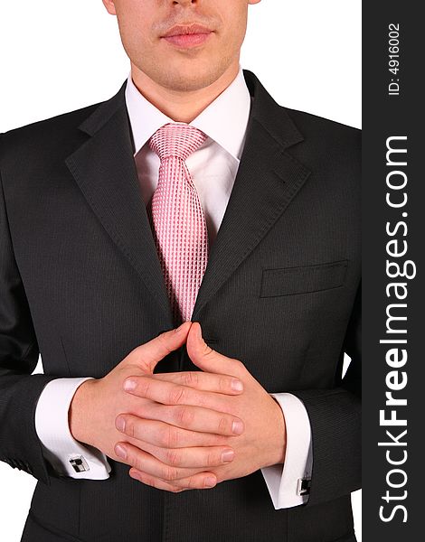 Young businessman with folded hands on white