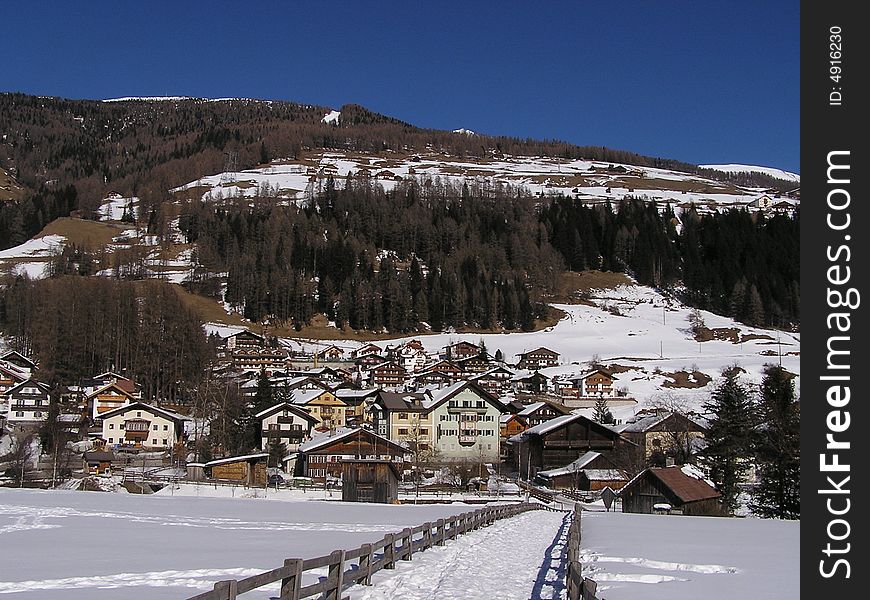 Alps mountain village in winter in Sesto, Italy. Alps mountain village in winter in Sesto, Italy