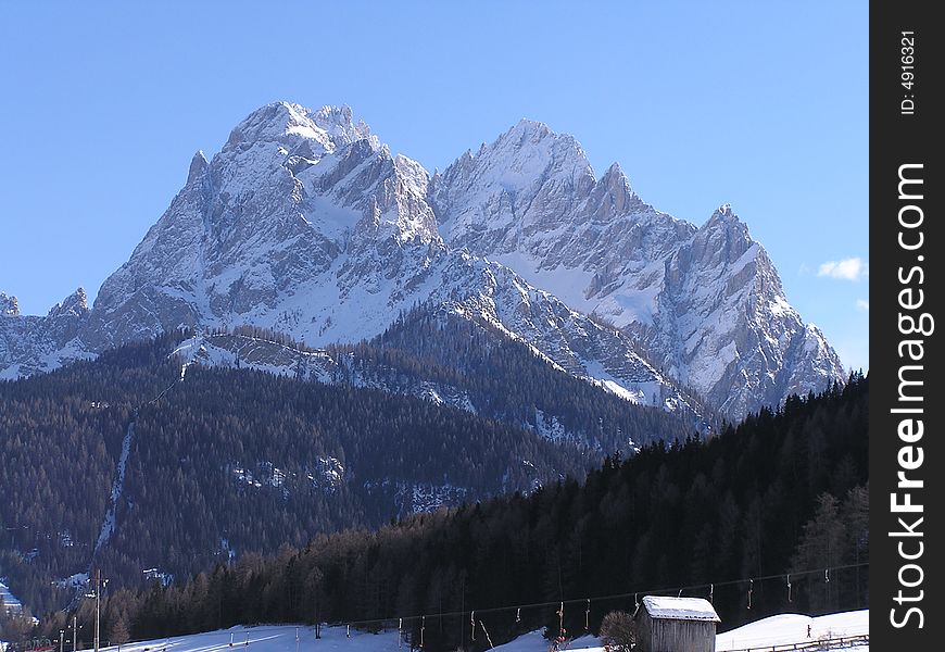Alpine mountain in winter in Sesto, Italy. Alpine mountain in winter in Sesto, Italy