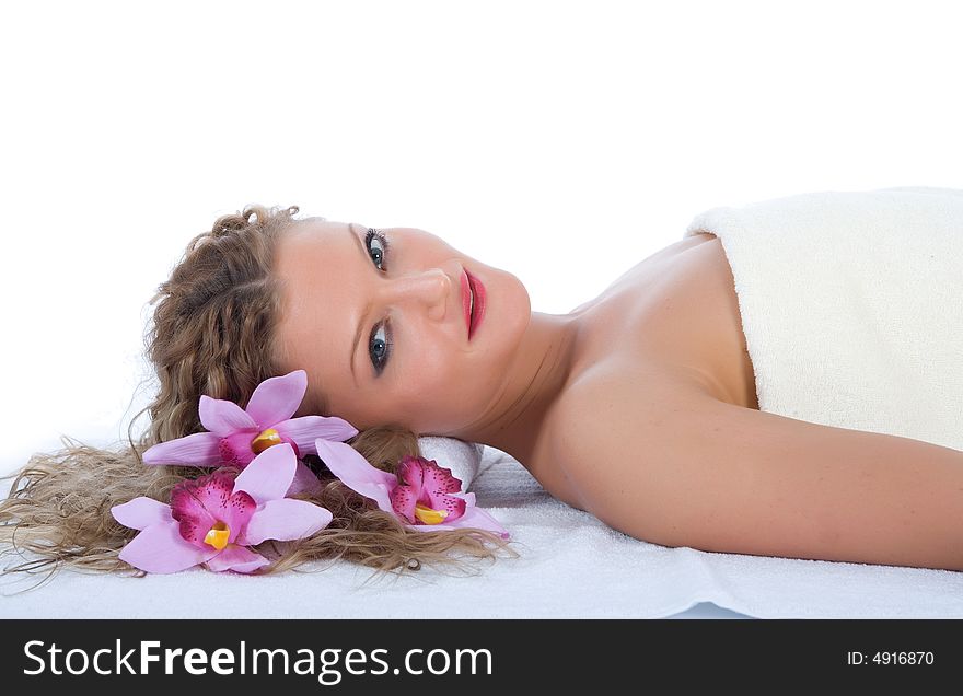 Attractive woman getting spa treatment on white