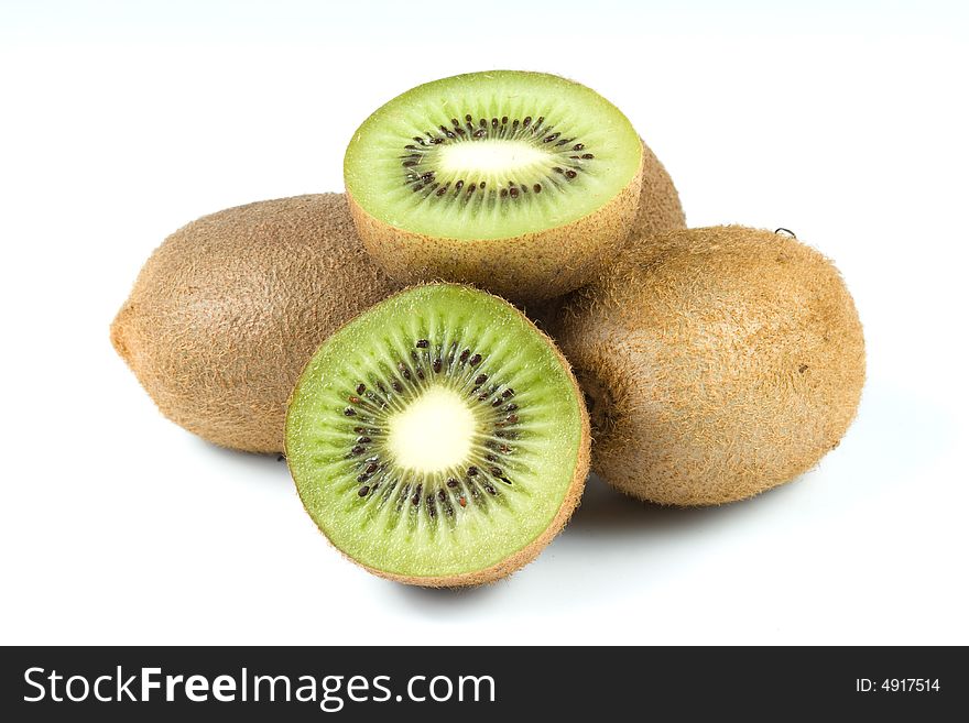 Ripe appetizing kiwi fruits isolated on a white background. Ripe appetizing kiwi fruits isolated on a white background