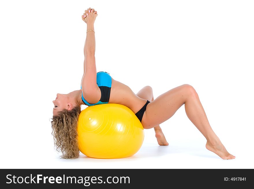 Girl practicing fitness  on  white  background