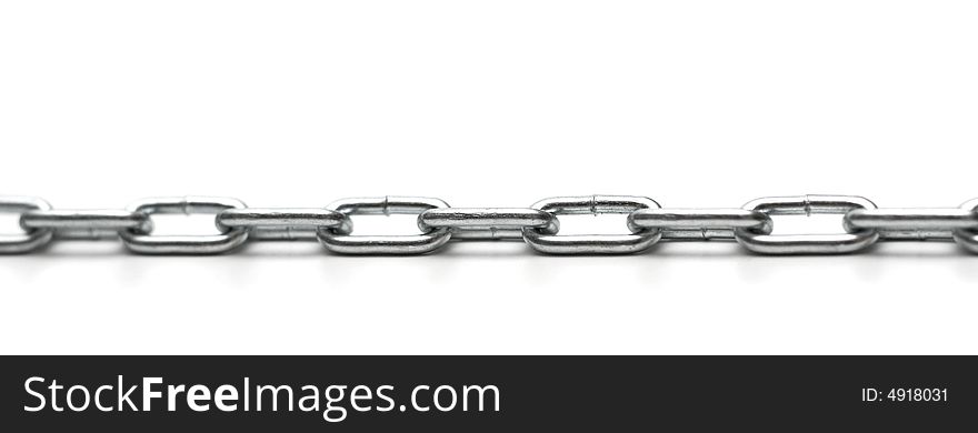 Metallic chain on white background, abstraction