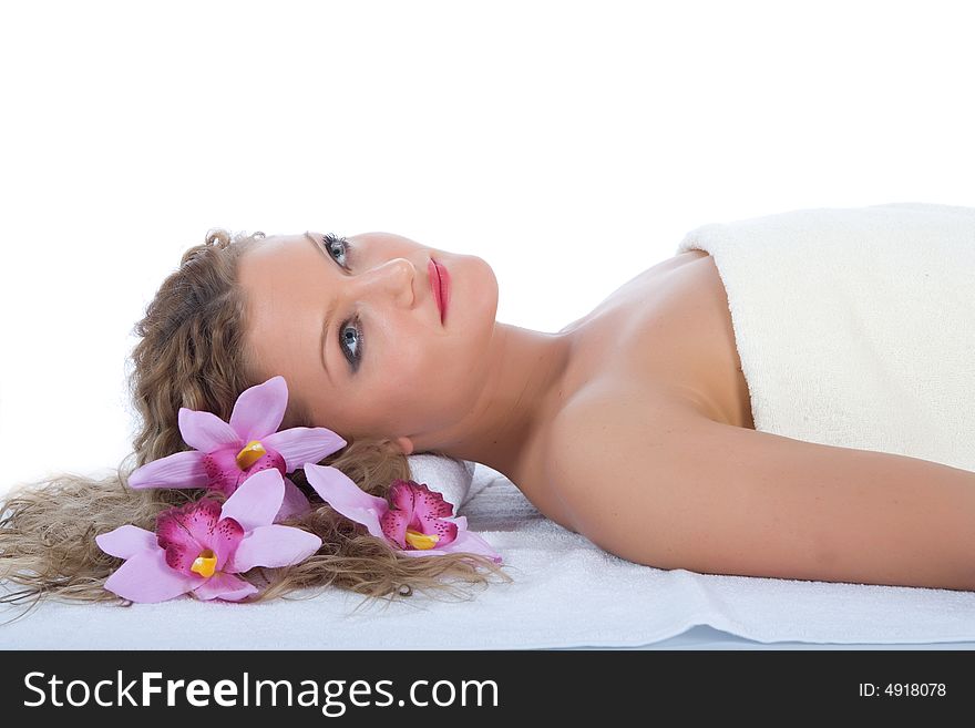 Attractive woman getting spa treatment on white