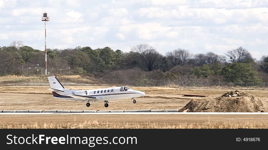 A private jet with the state flag of Texas on the tail. A private jet with the state flag of Texas on the tail
