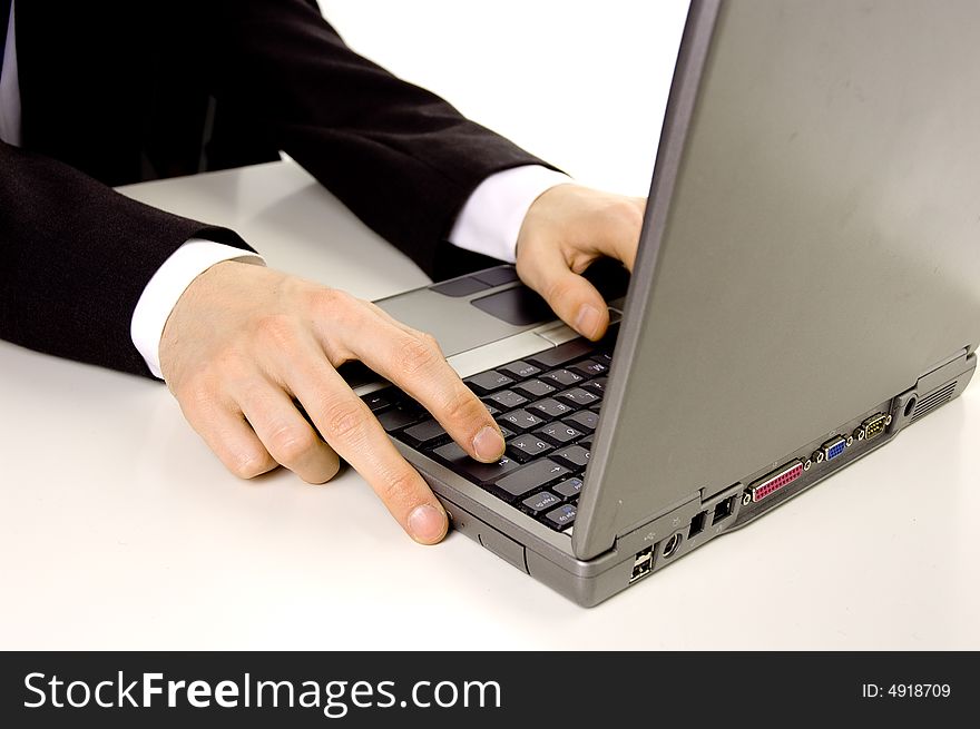 Businessman typing on laptop
