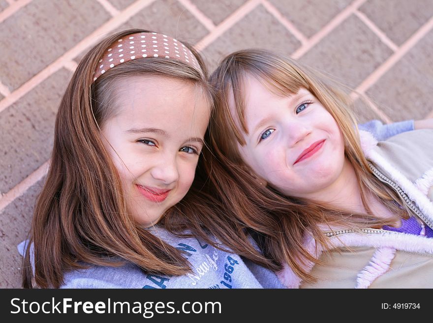 Two young girls spending time together. Two young girls spending time together