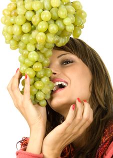 Woman Eating Grapes Stock Photography