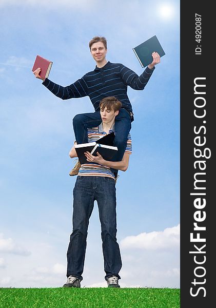 The two young students with the book. The two young students with the book