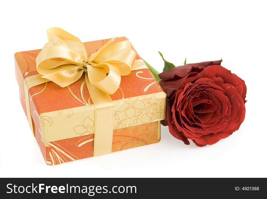 Gift box with ribbon and red rose isolated on white