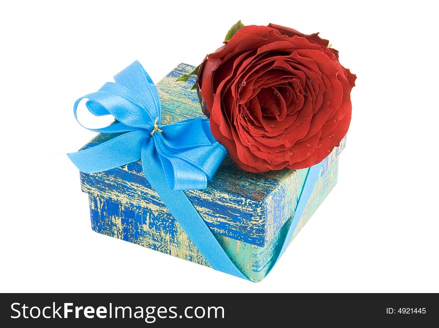 Gift box with ribbon and red rose isolated on white