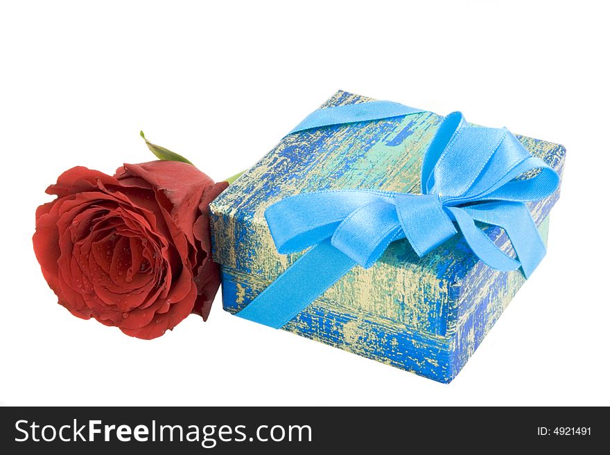 Gift box with ribbon and red rose isolated on white