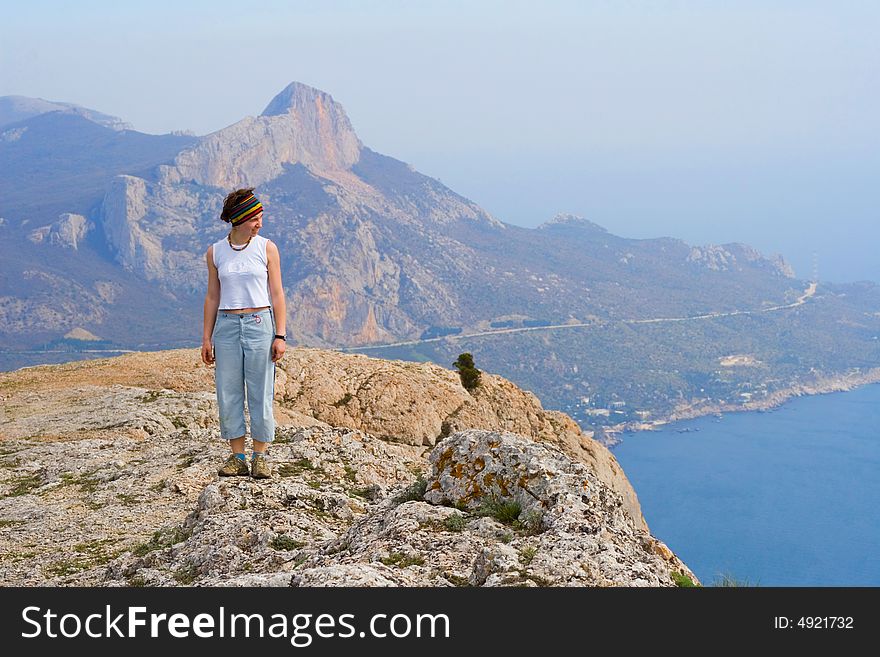 Girl on the top of mountain