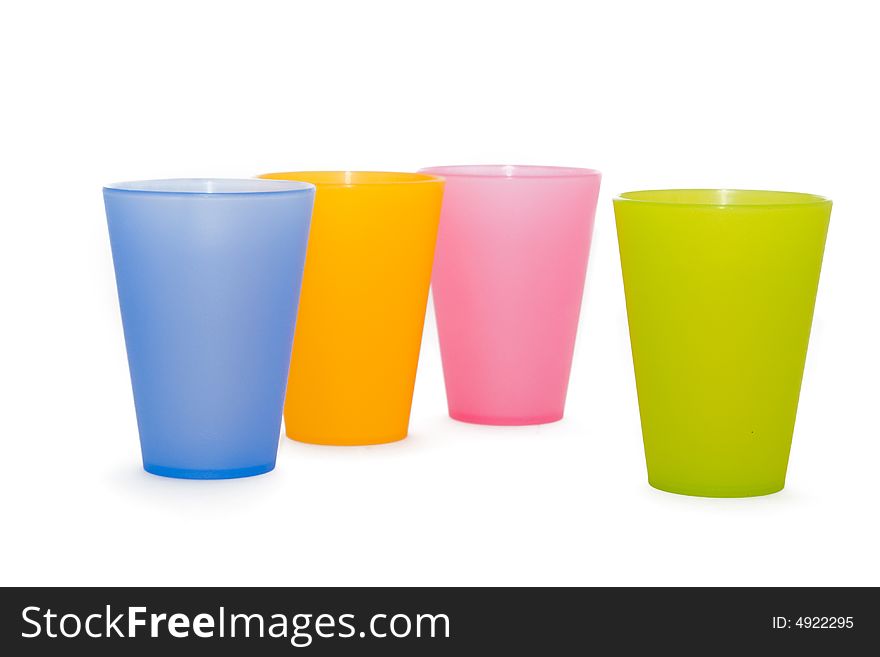 Color plastic glasses on a white background
