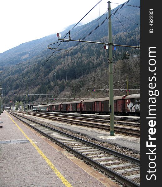 A goods train stopped in a train station