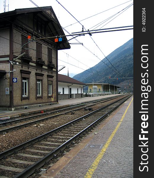 A goods train stopped in a train station