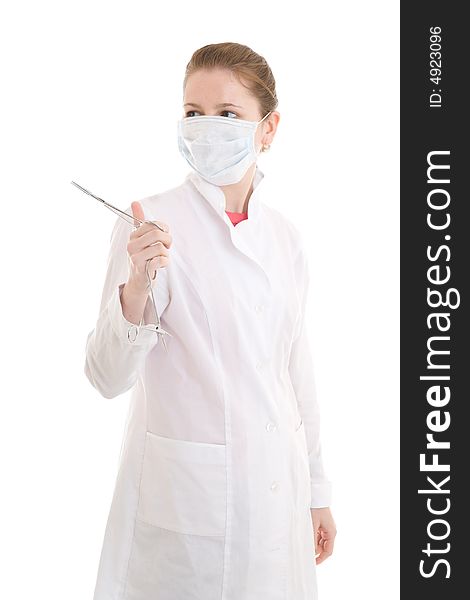 The young nurse with scissors isolated on a white background