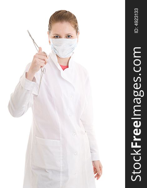 The young nurse with scissors isolated on a white background