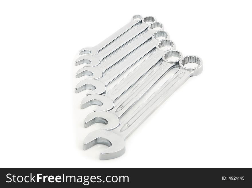 Close up of set of wrenches on a white 
background