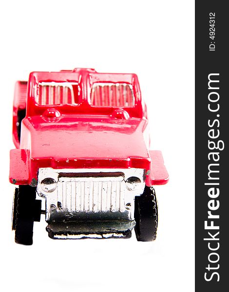 Single red car auto toy macro close up