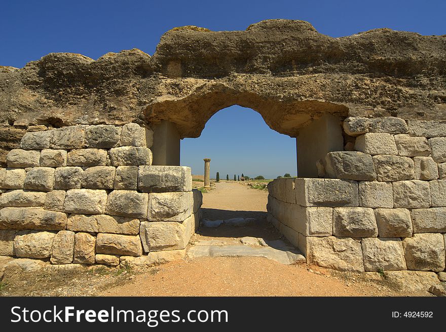 Roman arch ruin at Empurias Bay of Roses Spain