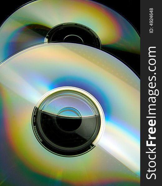 Two bright and colorful blank CD’s. Two bright and colorful blank CD’s