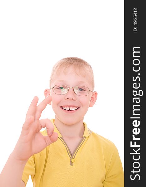 Photo of smiling teenager showing OK sign.