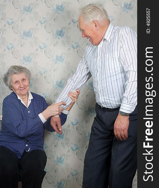 Happy old couple play the fool