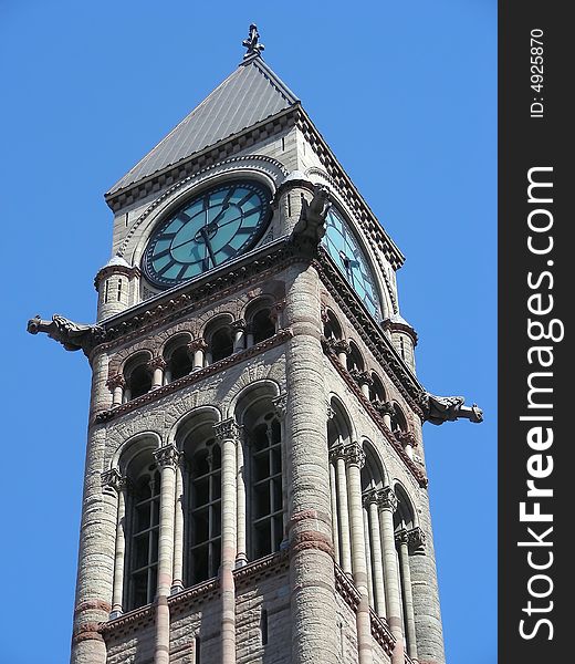 Gargoyles on the clock tower of Old City Hall, Toronto, Canada.