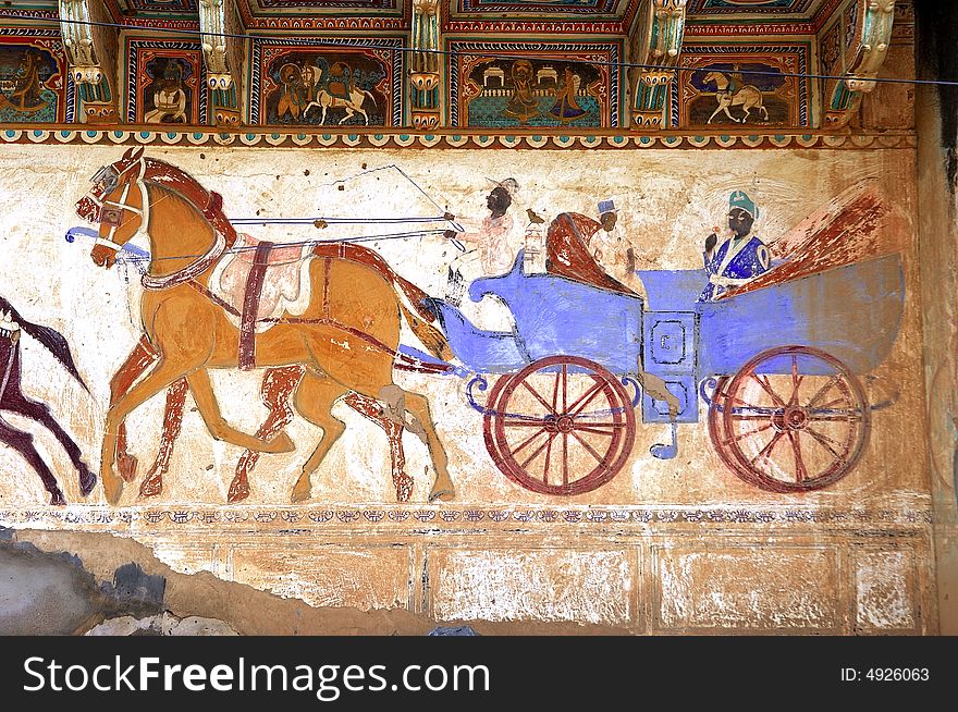 India, Mandawa: colourful frescoes  on the walls of the ancient houses.