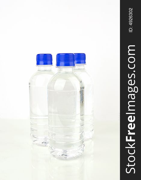 Bottled water isolated against a white background