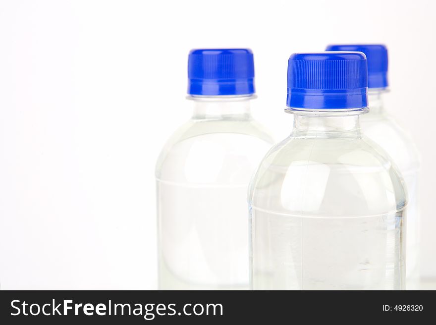Bottled water isolated against a white background