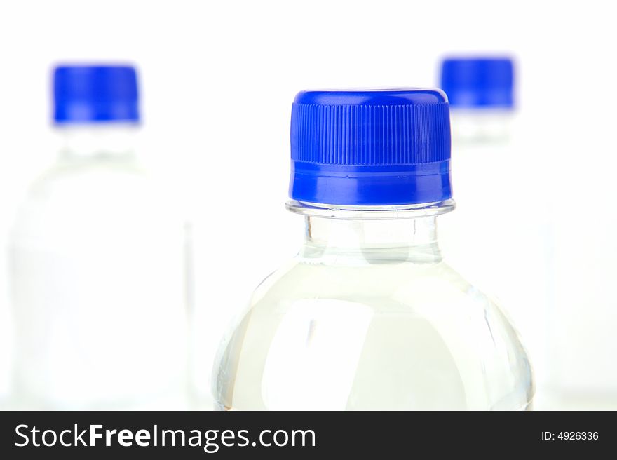 Bottled water isolated against a white background