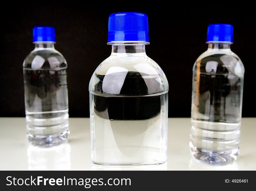 Bottled water isolated against a white background