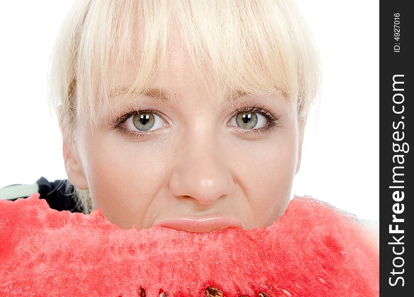 Beautiful green-eyes blondy eating sweet water-melon. Beautiful green-eyes blondy eating sweet water-melon