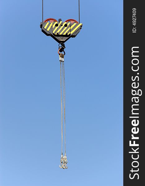 Lifting crane hook on a construction site