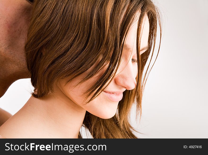Young adult couple in the studio hugging. Young adult couple in the studio hugging