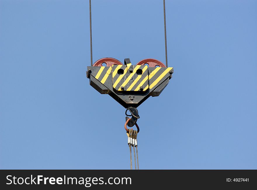 Lifting crane hook on a construction site