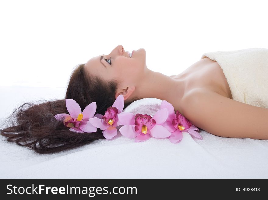 Attractive woman getting spa treatment on white