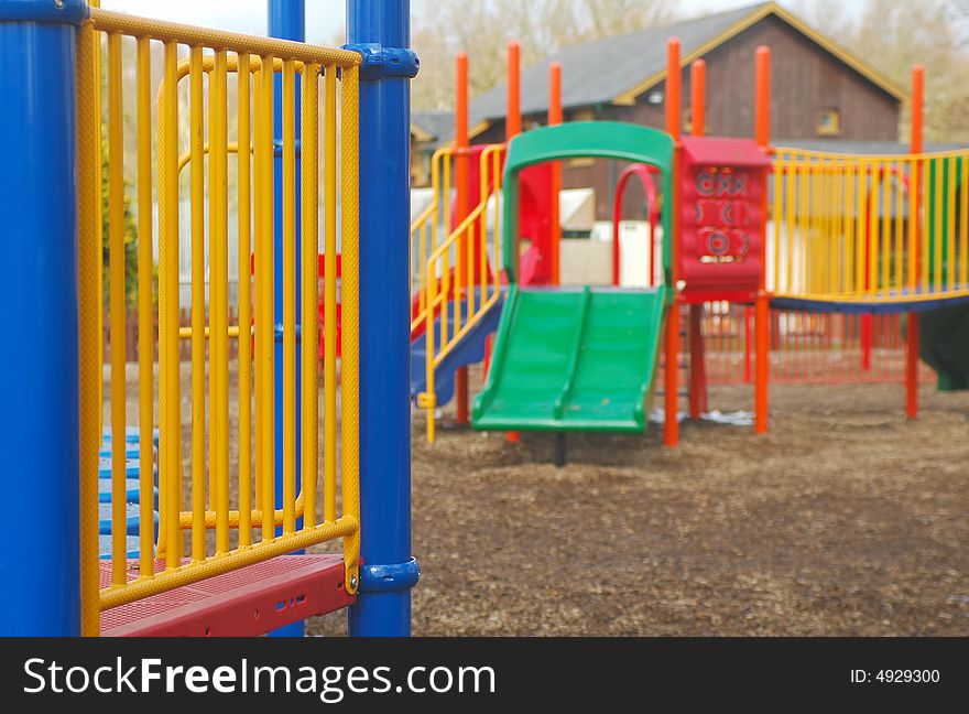 Colorful children's playground of climbing frames and slides. Colorful children's playground of climbing frames and slides