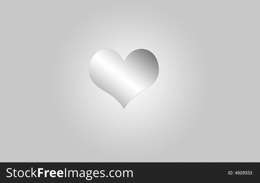 Silver heart on gray background