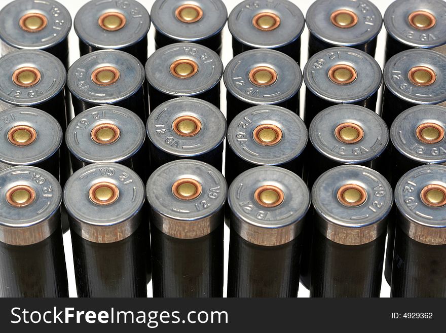 12 gage black shotgun shells background image