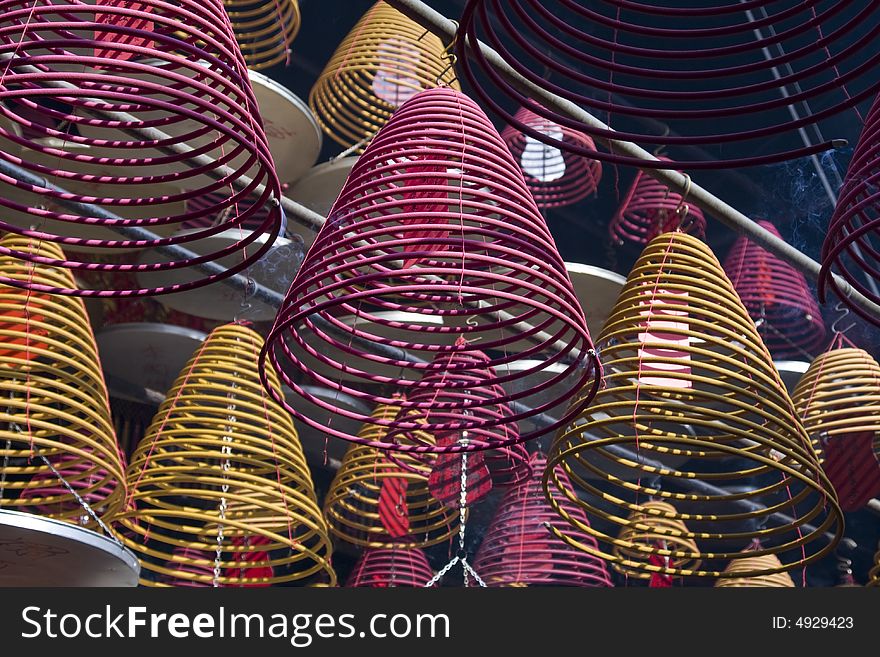 Incense coils burning in a chinese temple in Hong Kong