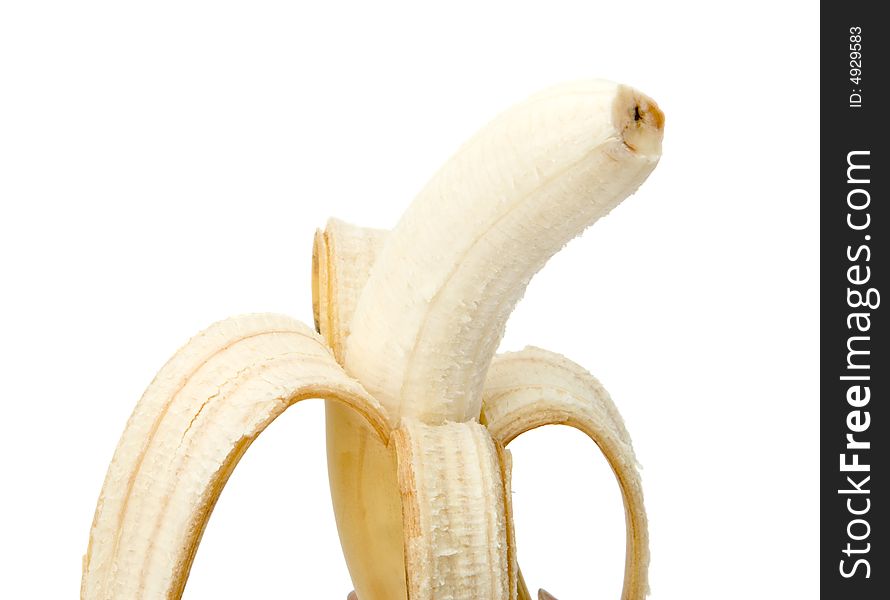 Peeled ripe banana close up on white background