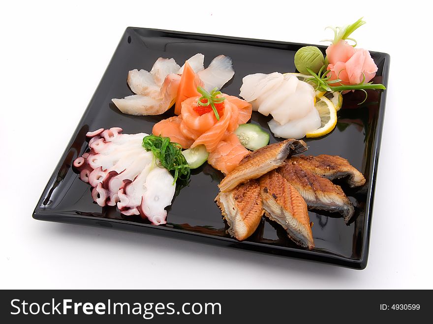 Made dish of sashimi on white