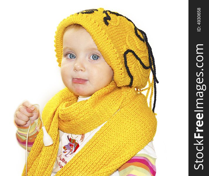 Beauty little girl, yellow cap and scarf. Beauty little girl, yellow cap and scarf